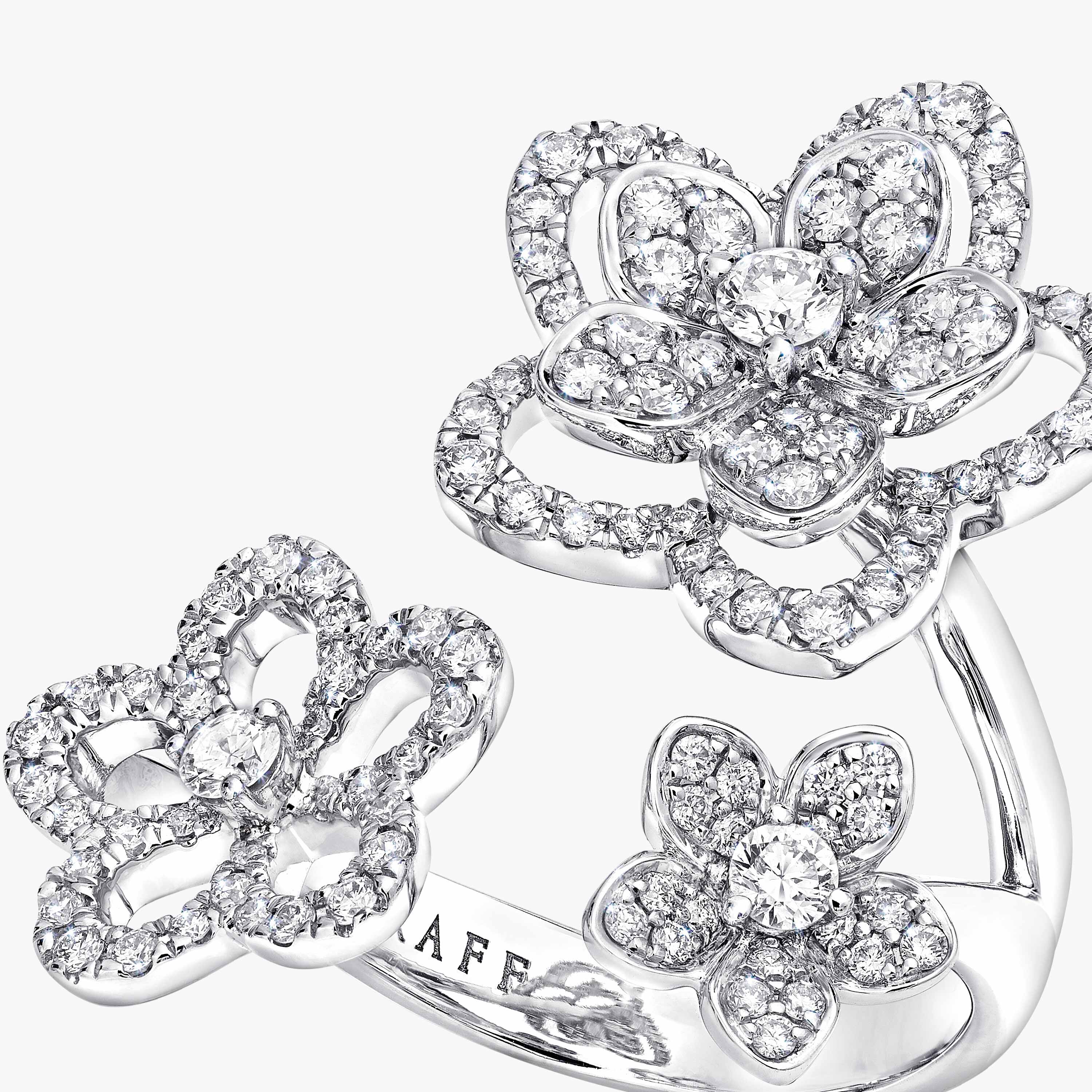 Three flower diamond best sale ring