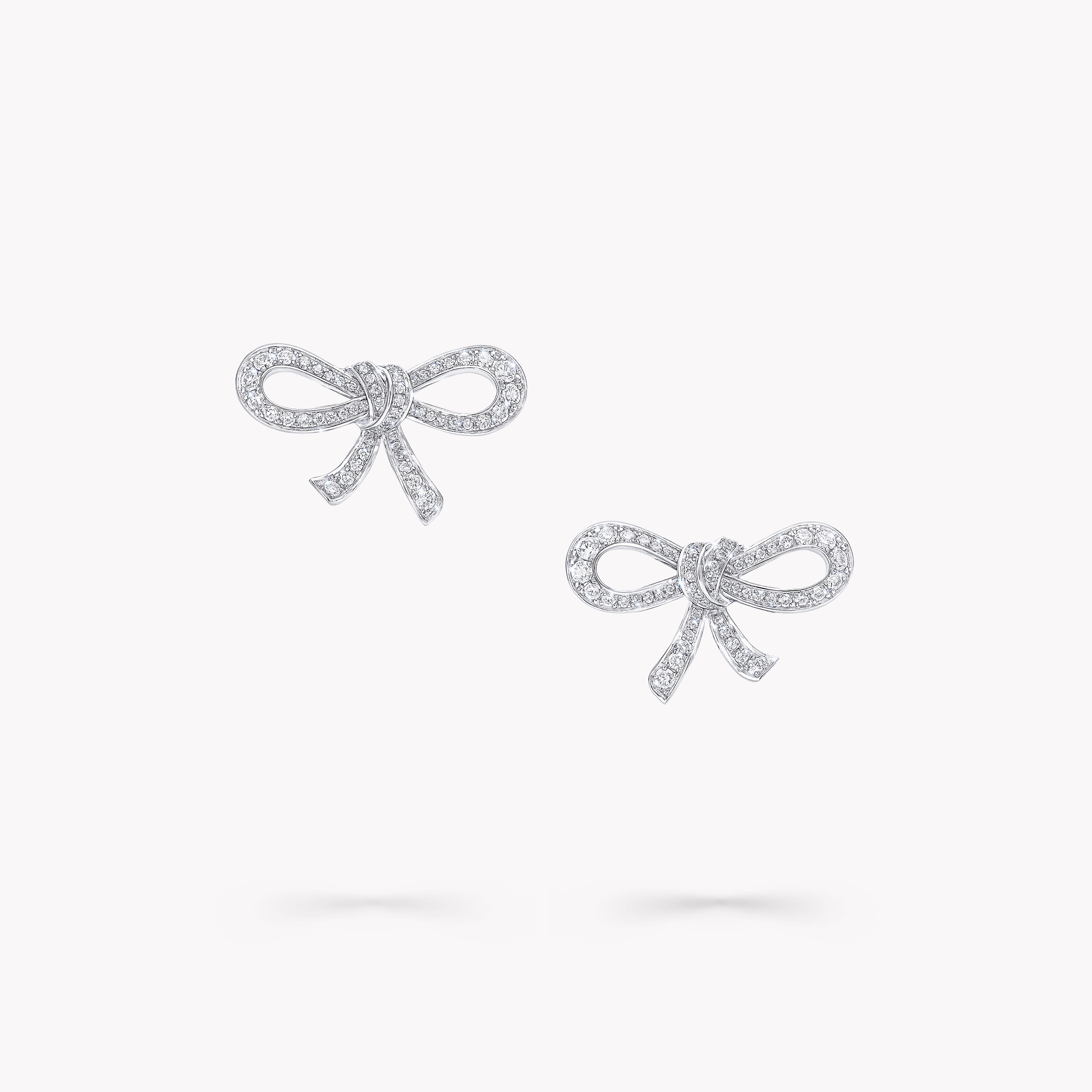 White gold bow earrings sales