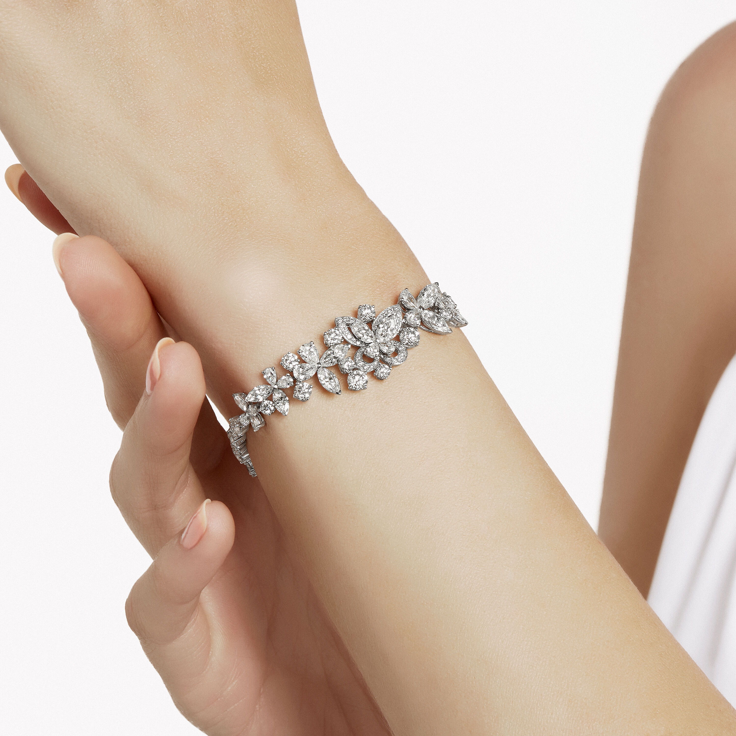 Tennis bracelet top with butterfly