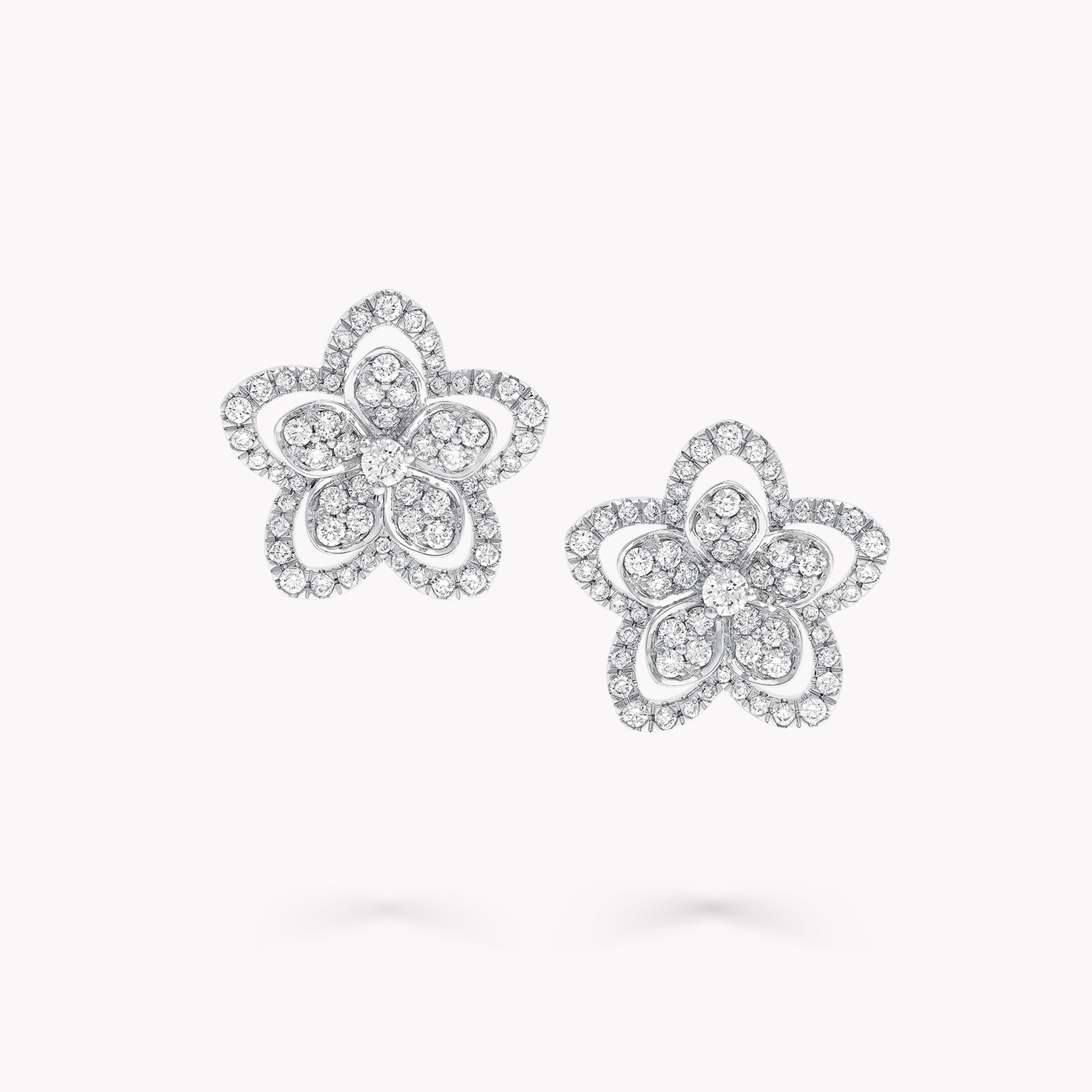 Diamond flower studs hot sale
