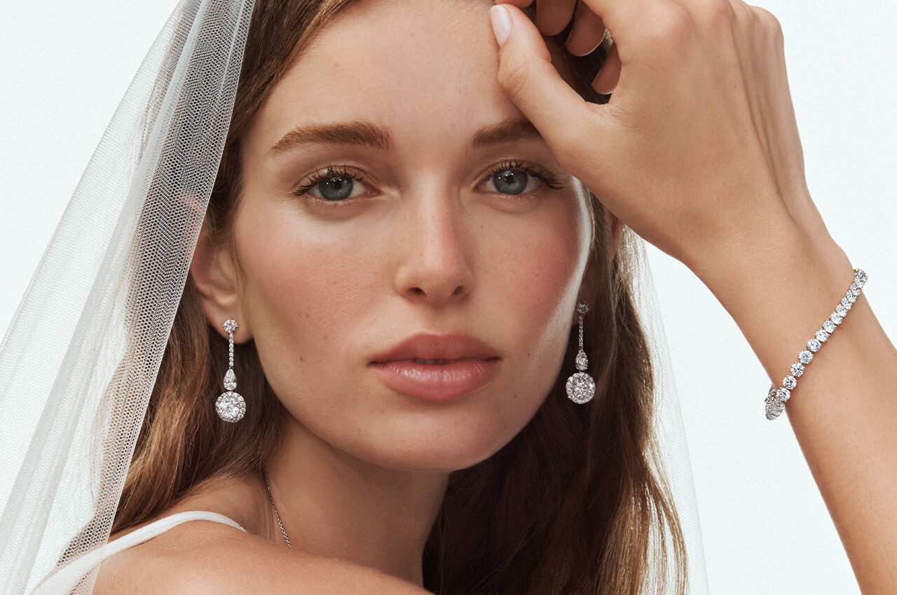 Image shows female model wearing Graff bridal jewellery