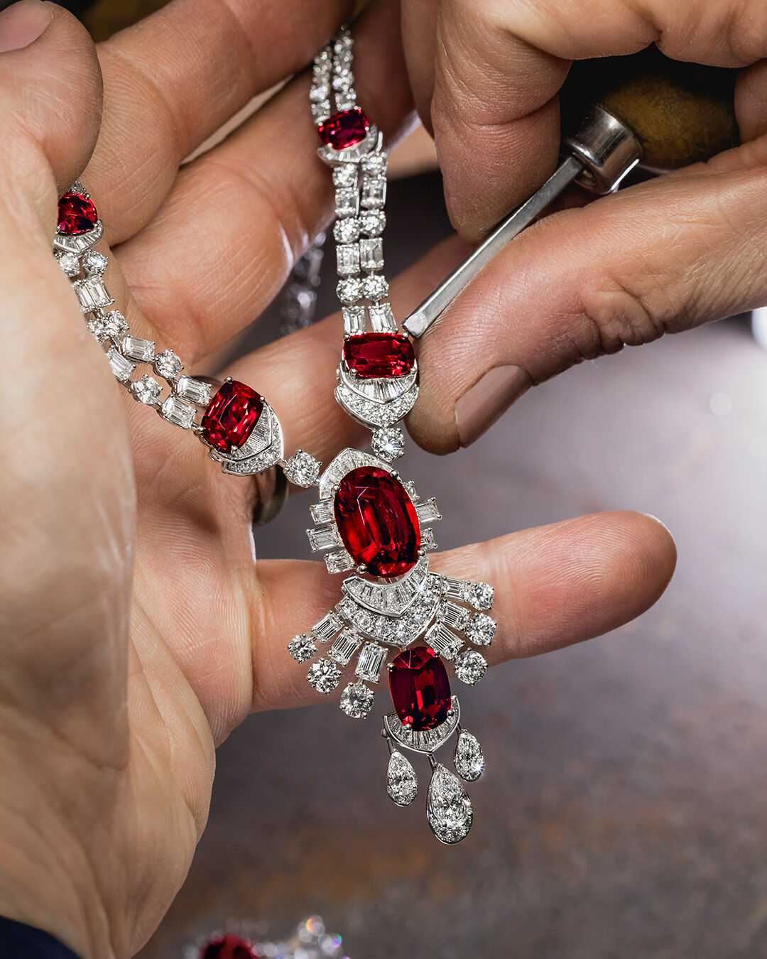 Image shows Graff Ruby High Jewellery necklace being created in Graff workshop