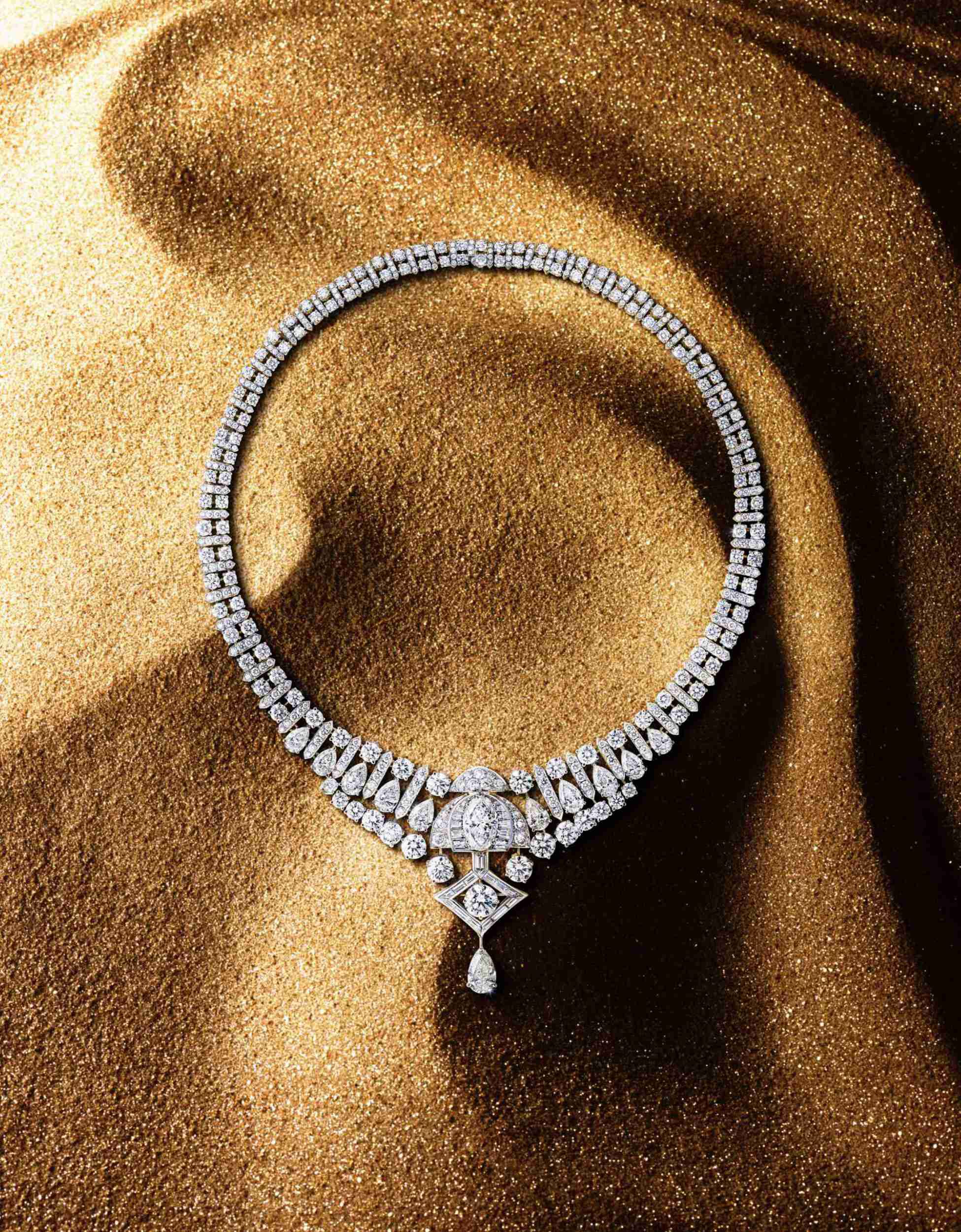 Model wears Graff Gateway diamond jewels from the Tribal collection in  a dessert.