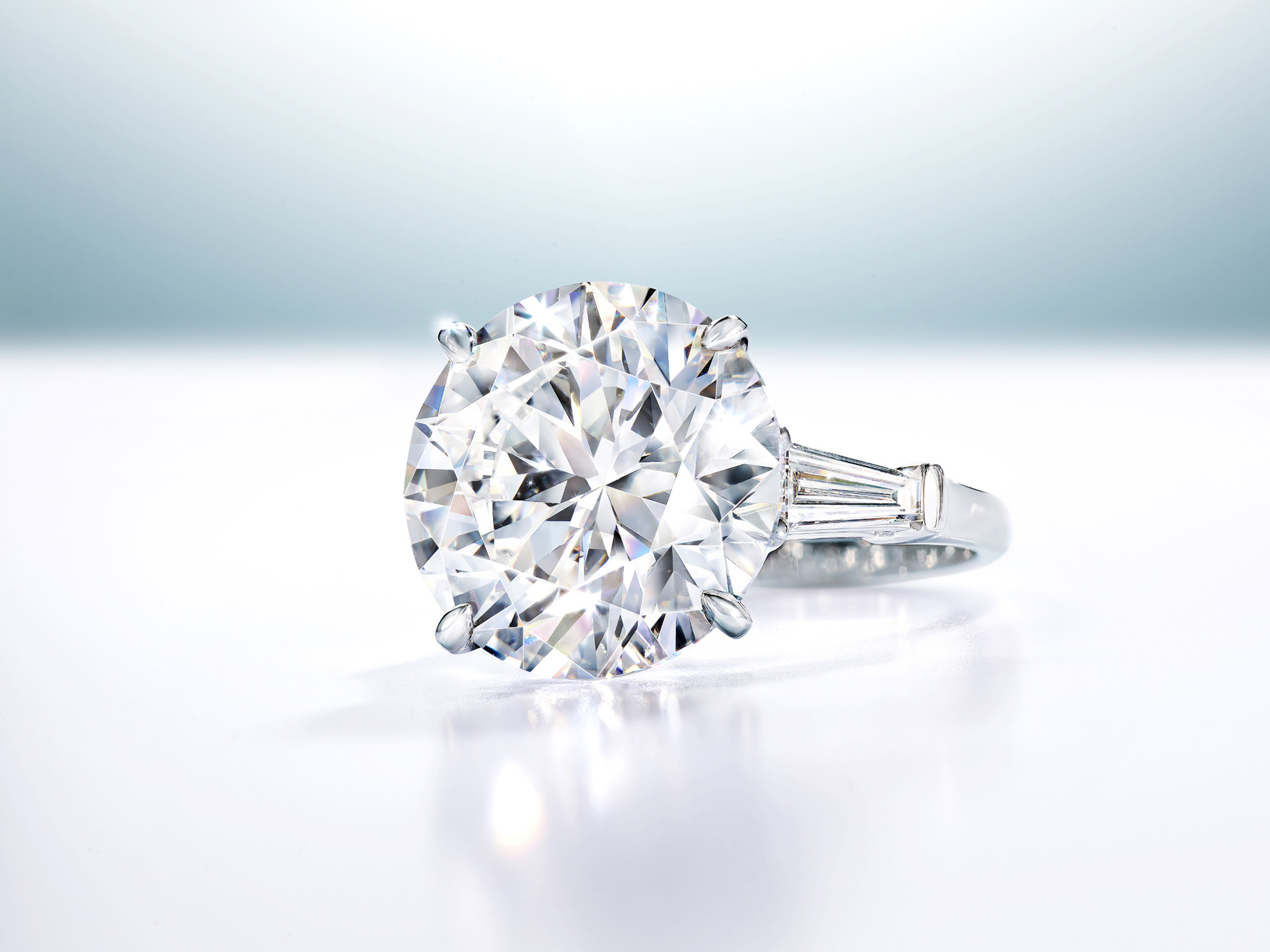 Promise Round Diamond Engagement Ring with baguette side stones from the Graff Bridal collection