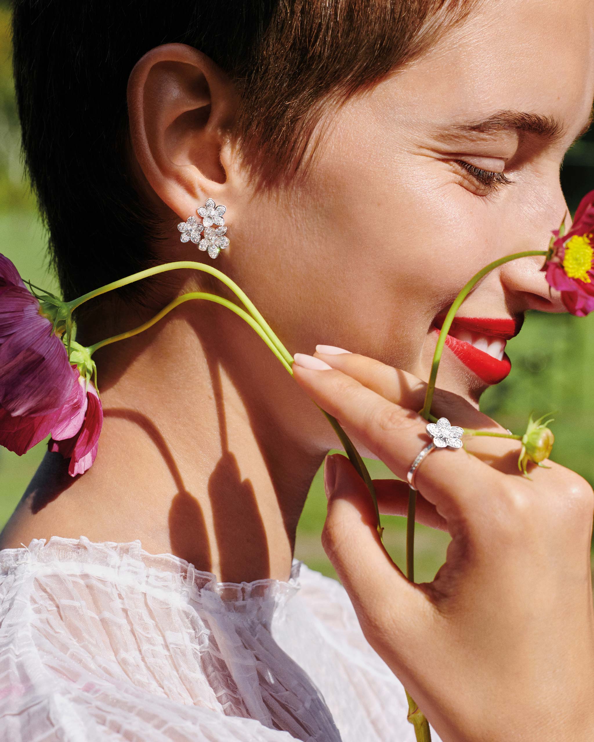 Model wearing Graff Wild Flower jewellery collection earrings