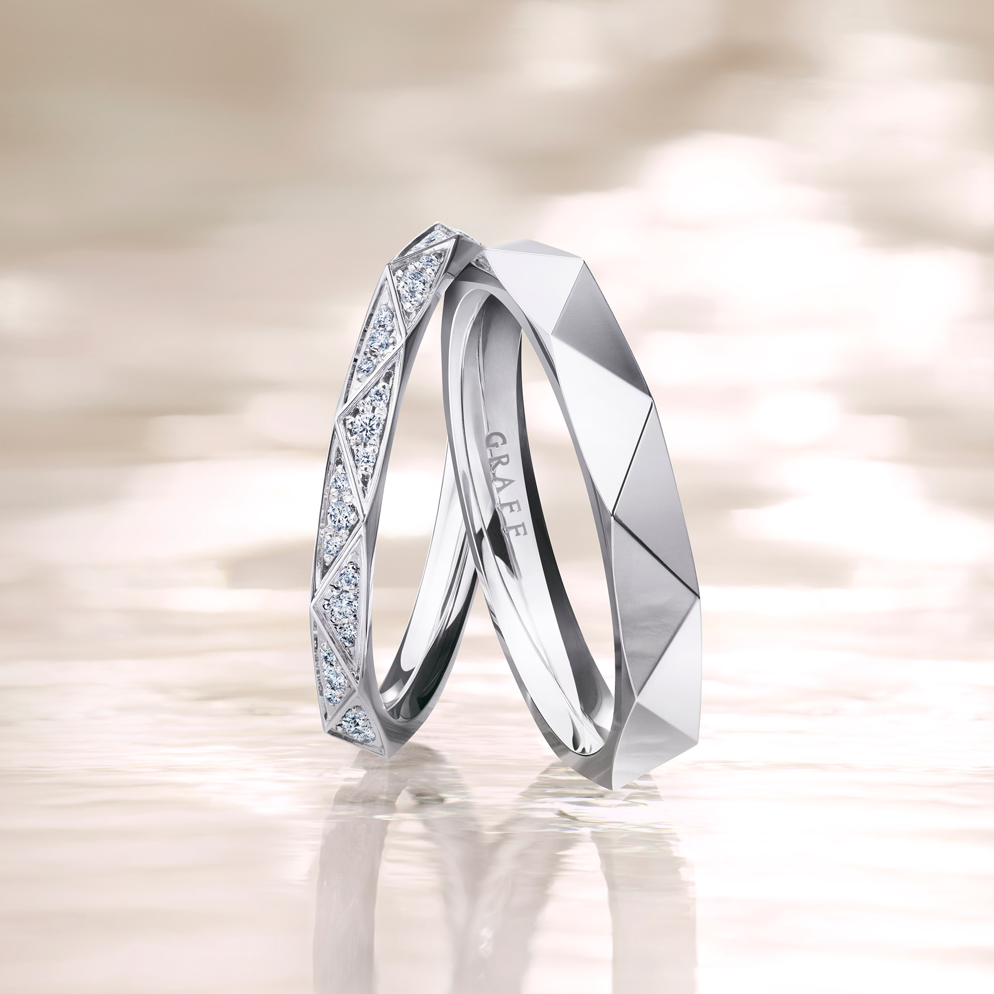 Stacked Laurence Graff signature bands in white Gold and rose gold, set with dIamond paves or plain
