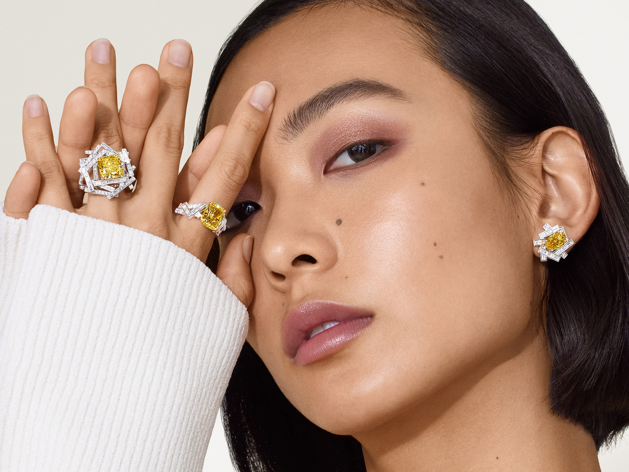 Model wears Graff Threads diamond earrings and rings