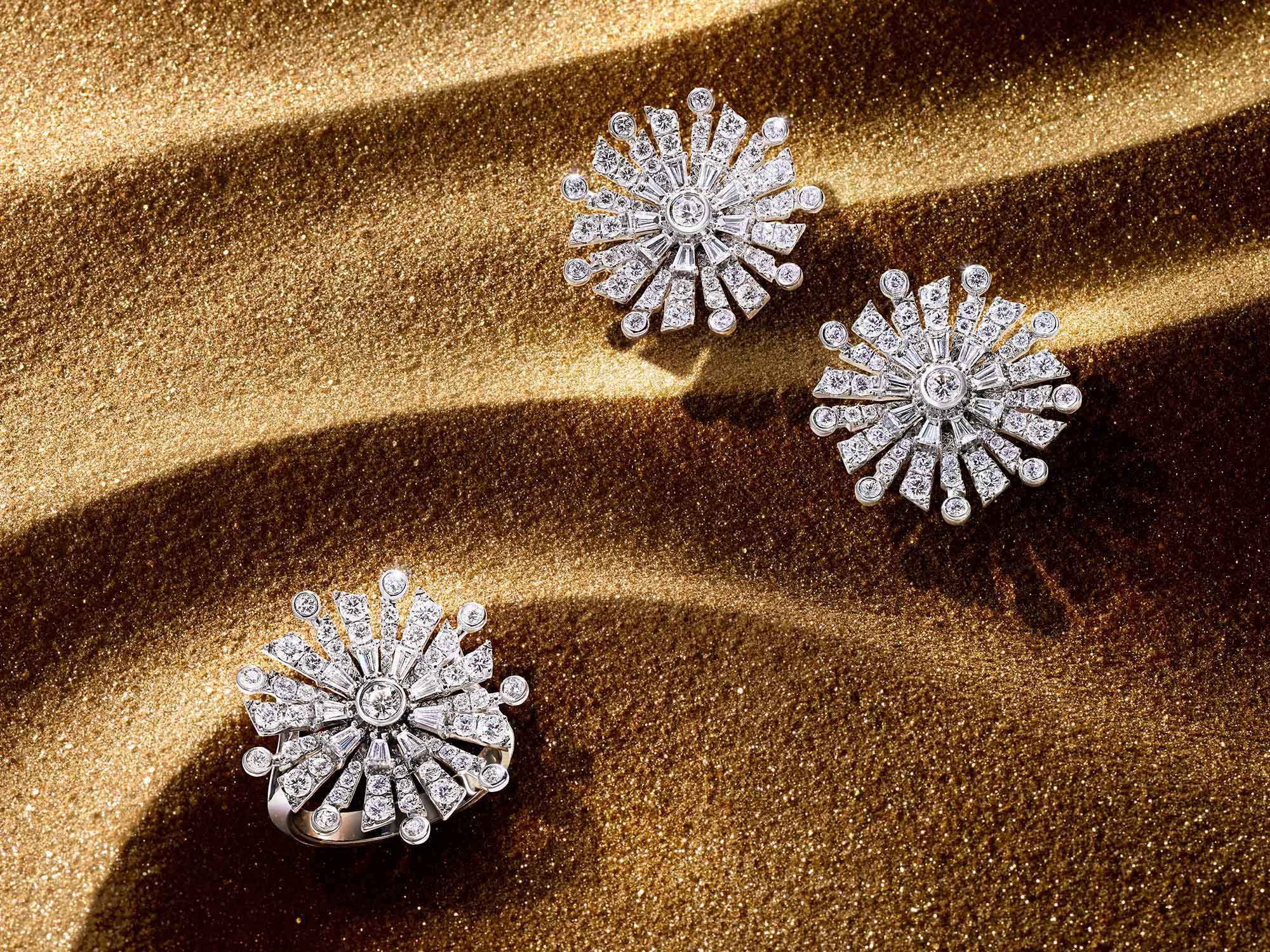 The Graff New Dawn diamond earrings and ring from the Tribal jewellery collection, on sand