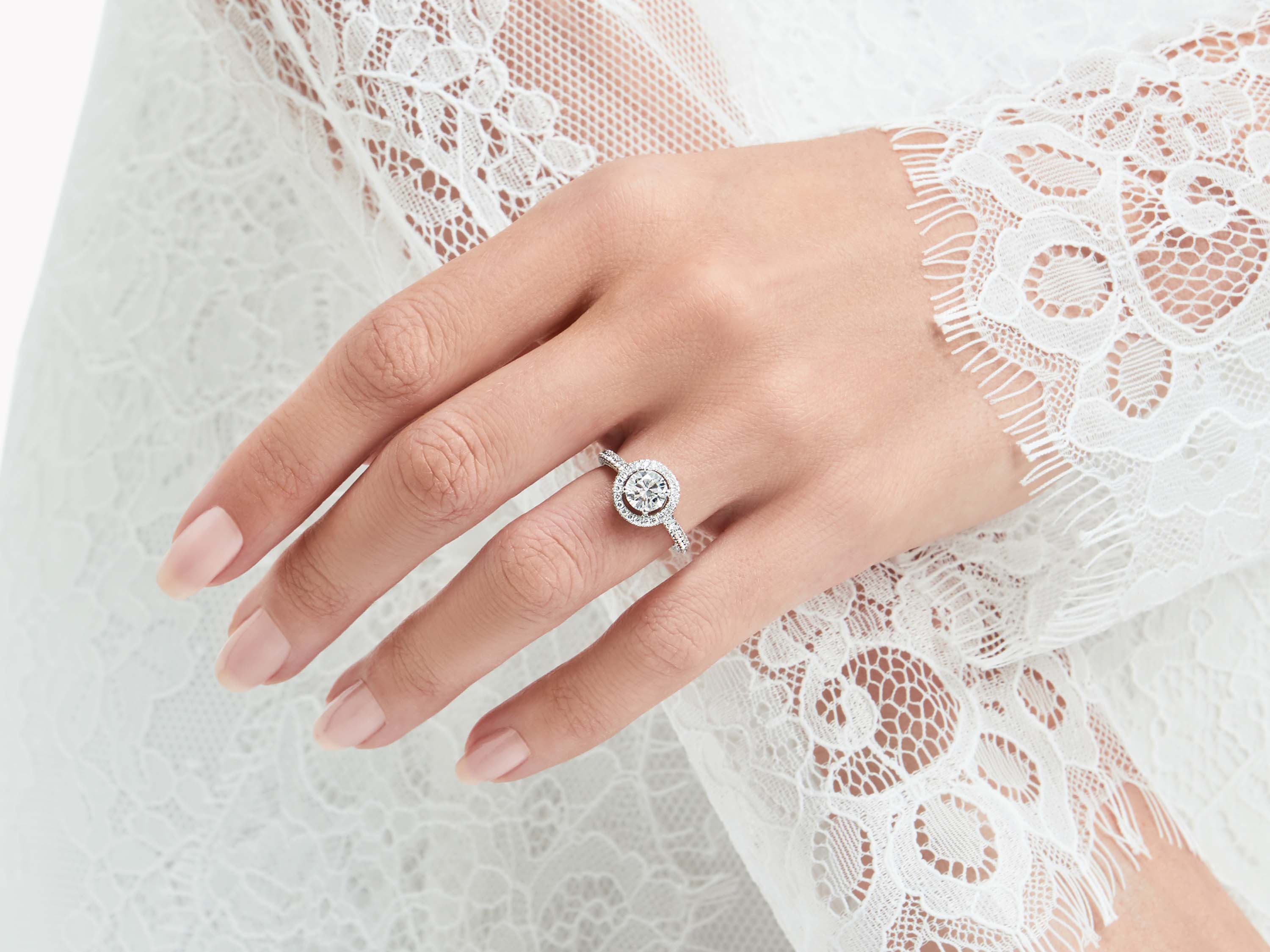 Model wears Constellation Round Diamond Engagement Ring from the Graff bridal jewellery collection