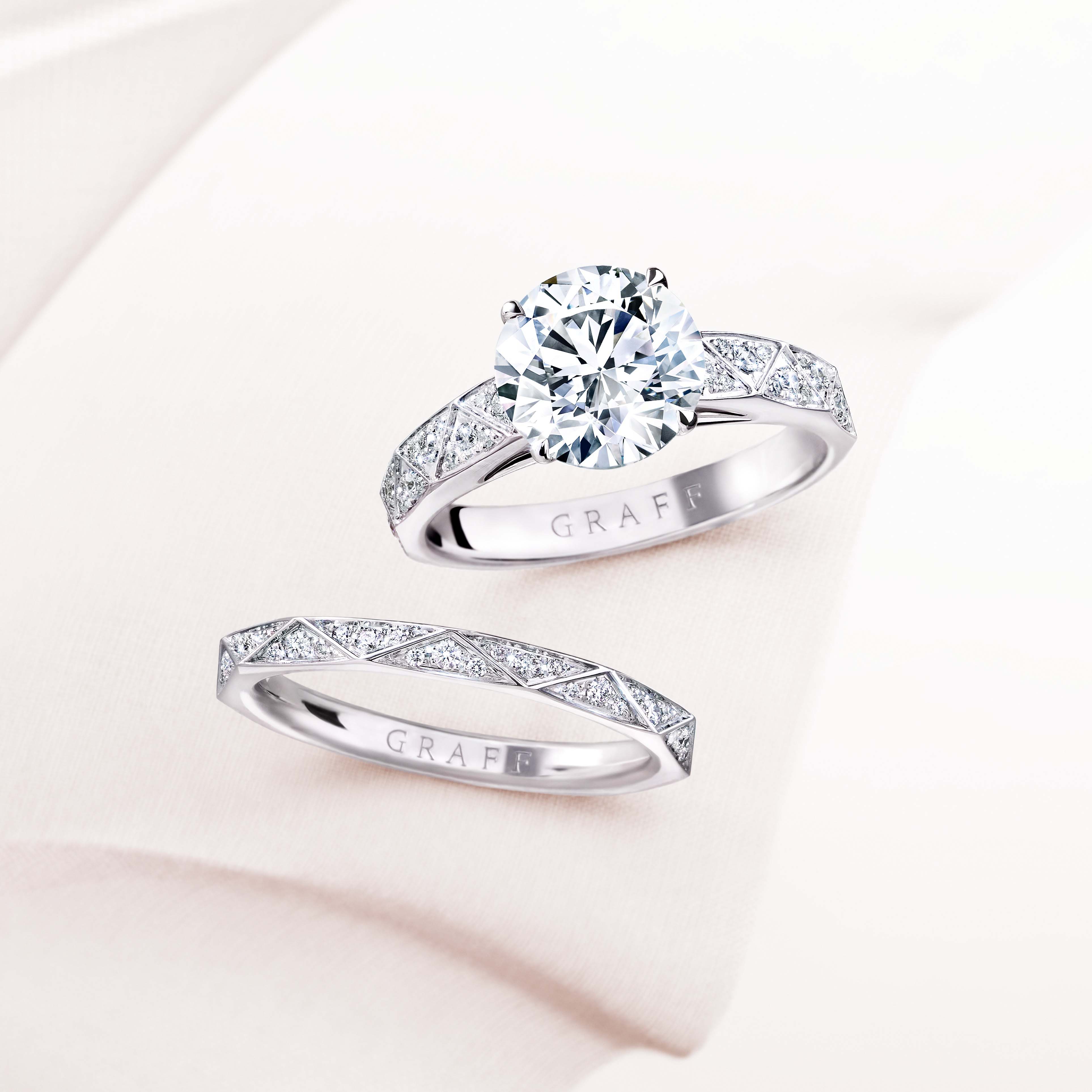 Laurence Graff Signature Round Diamond Engagement Ring and Laurence Graff Signature Diamond Band white gold