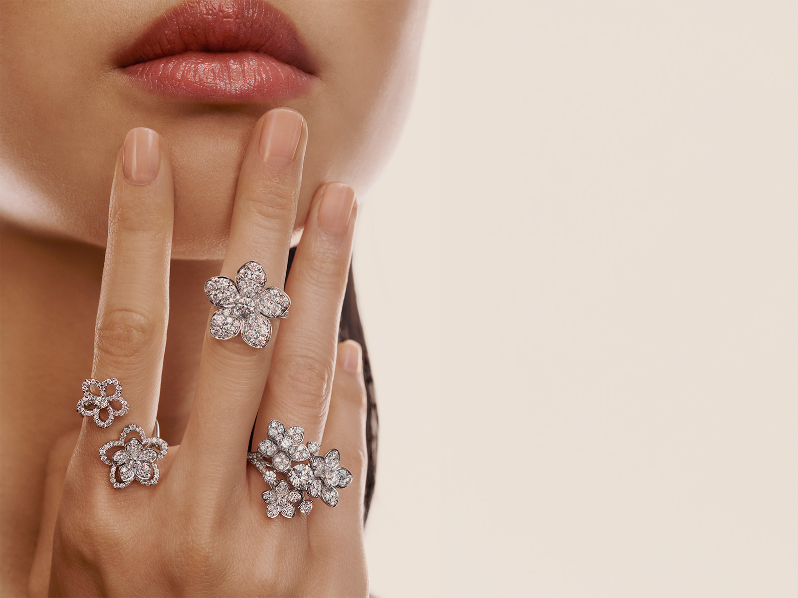 Model wearing Graff Wild Flower jewellery collection diamond rings