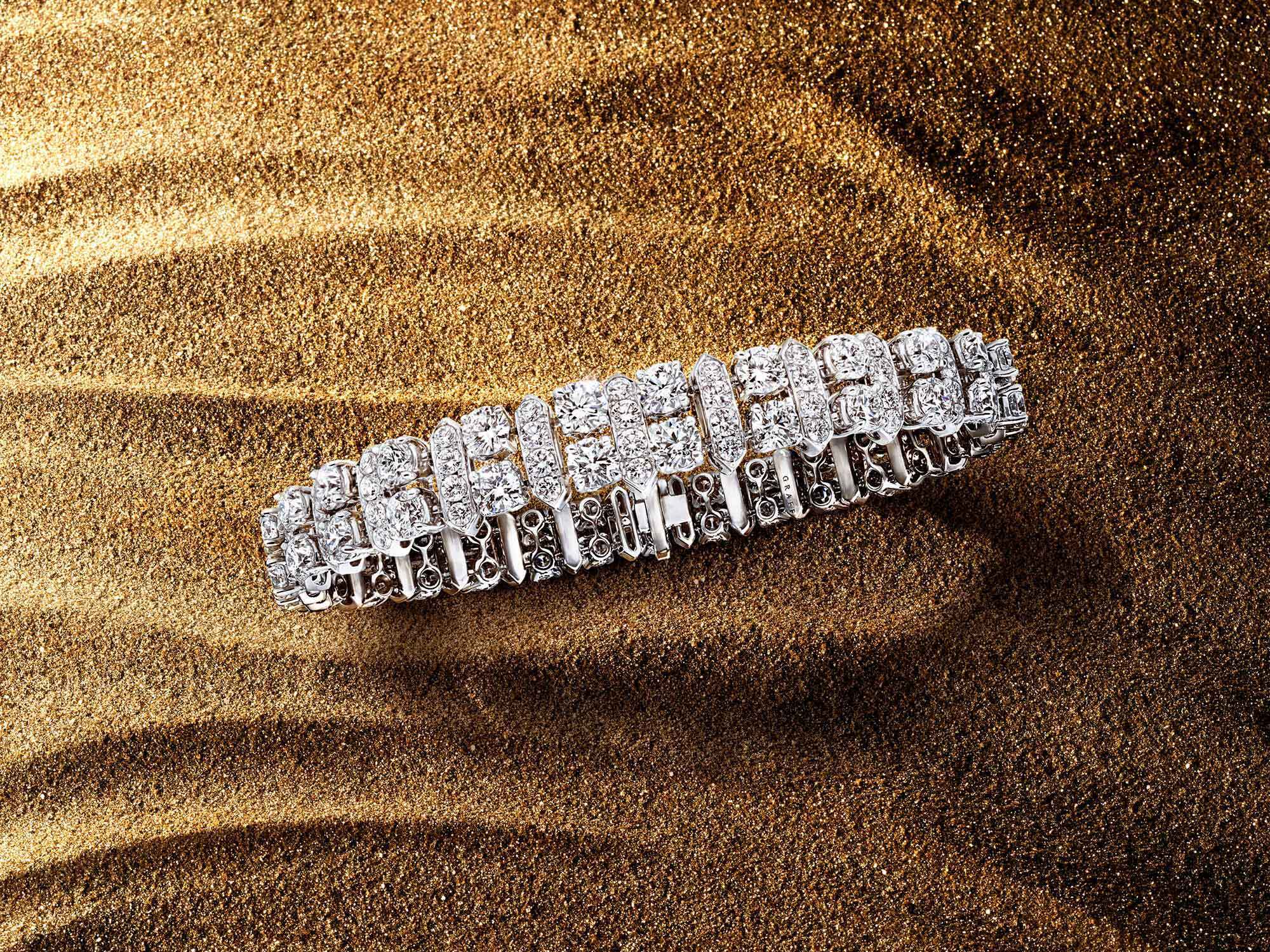 The Graff New Dawn diamond bracelet from the Tribal jewellery collection, on sand